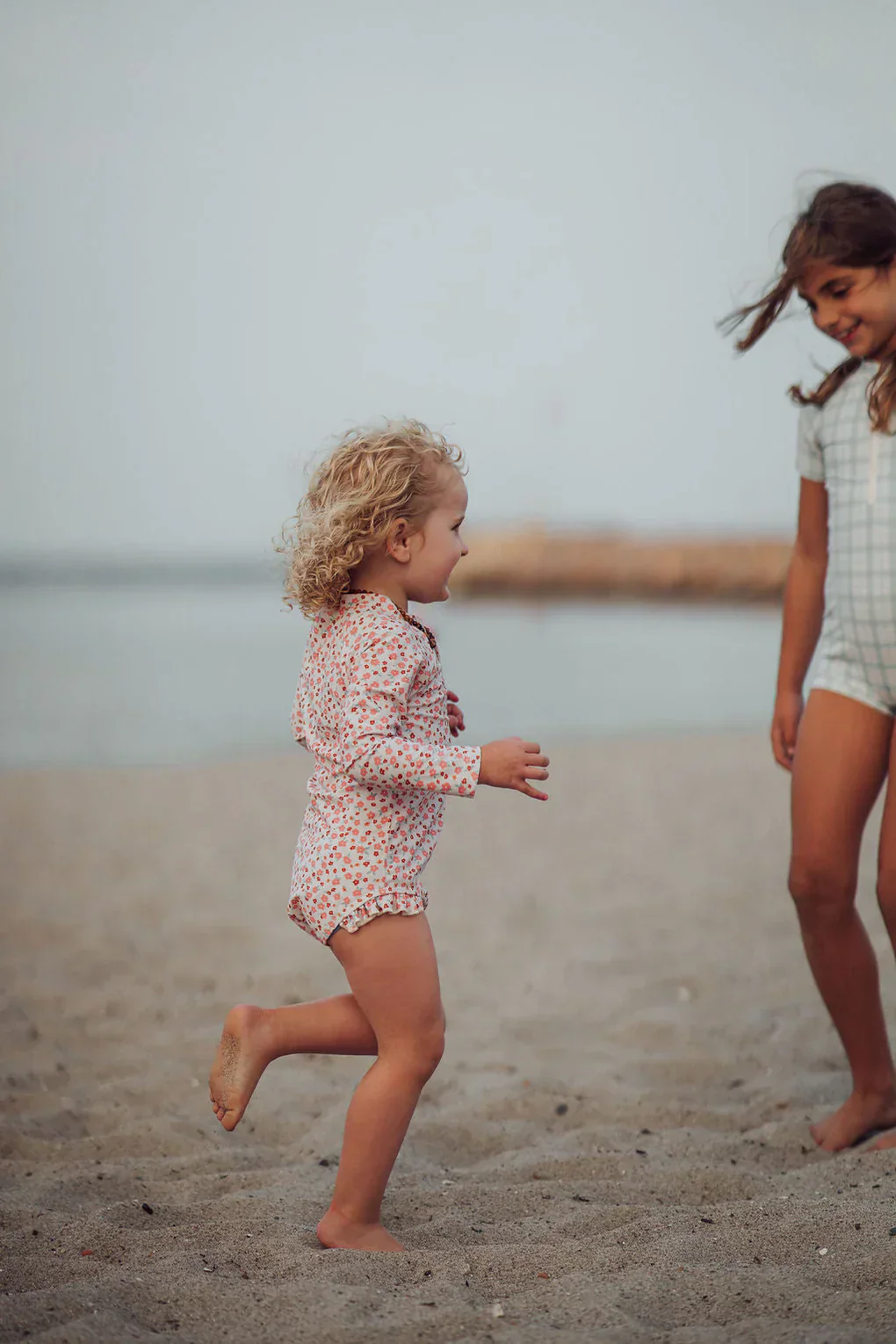 GRECH & CO. Long Sleeve Rashguard Ruffle Swimsuit | UPF + Recycled - Sunset Meadow - Image 7