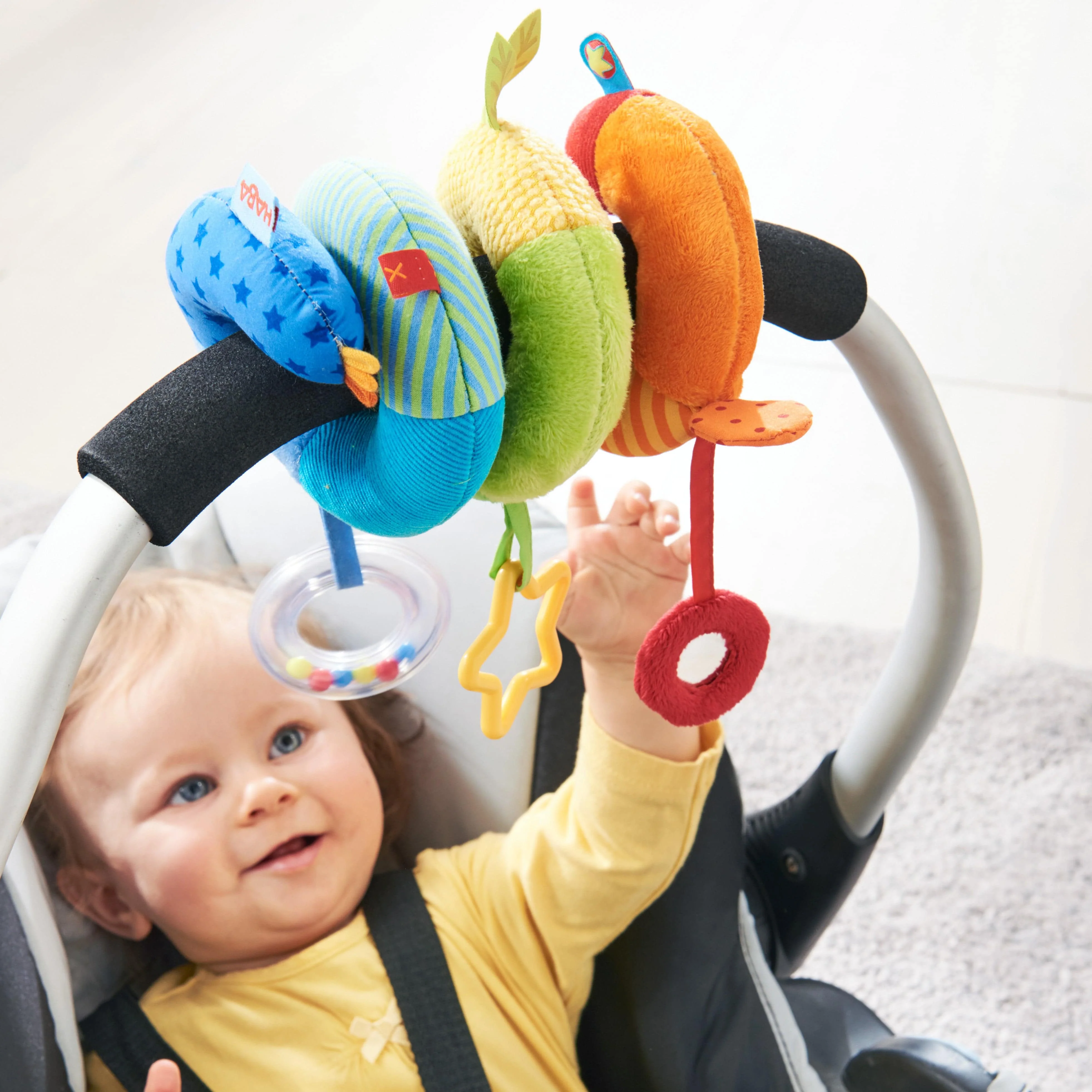 HABA Rainbow Activity Spiral Stroller & Car Seat Toy - Image 2