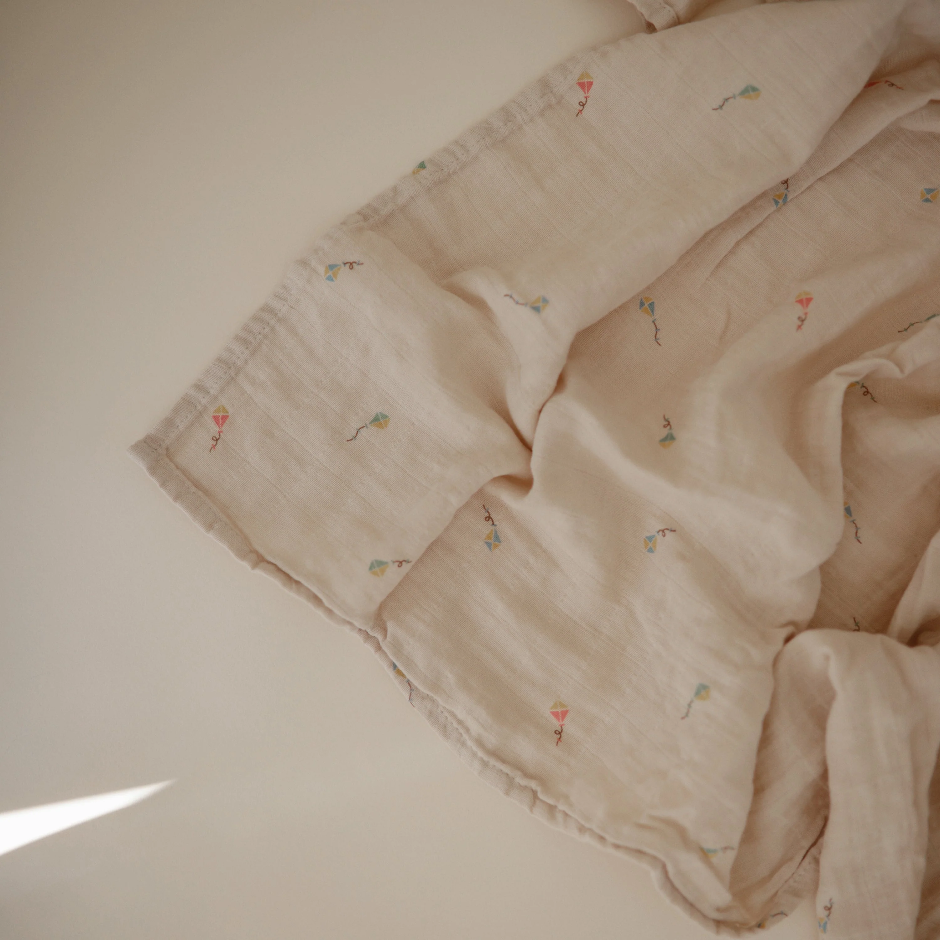 Mushie Organic Cotton Muslin Swaddle Blanket - Image 90